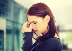 woman with a sinus headache